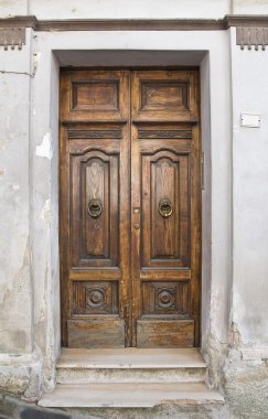 Wooden door. Tursi. Basilicata. Italy. clipart