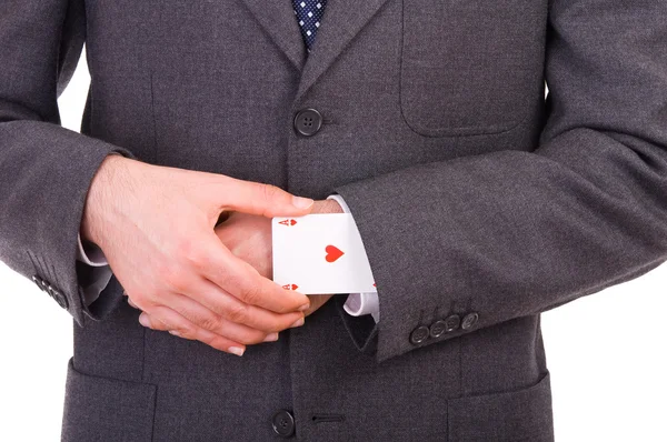 Homme d'affaires avec carte à jouer caché sous la manche . — Photo