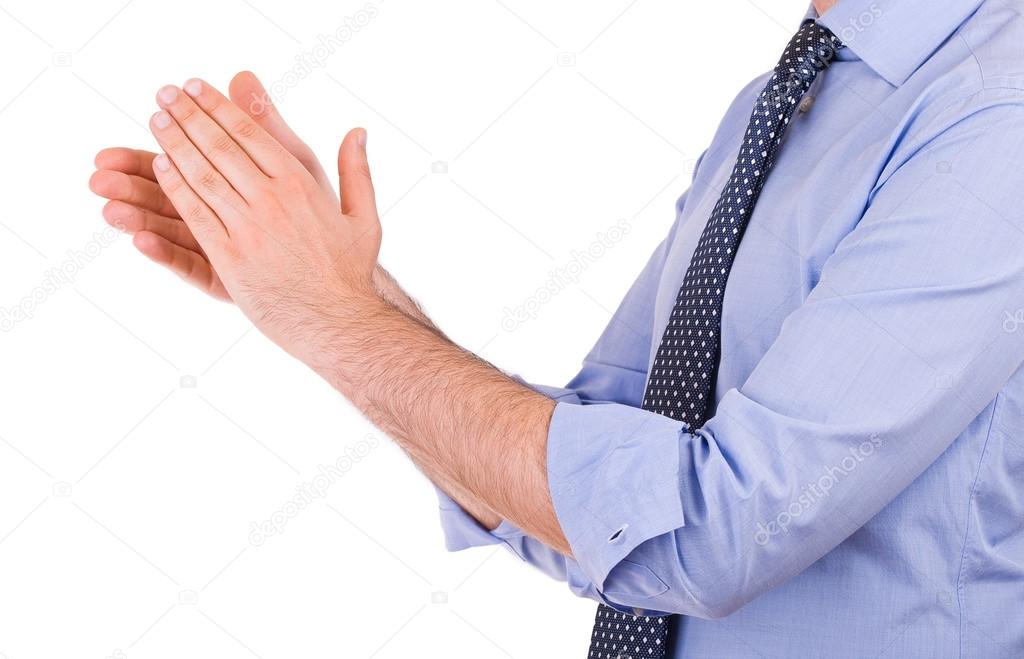 Businessman clapping his hands.