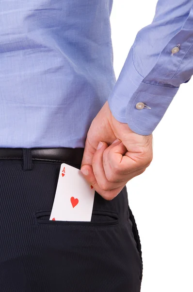 Businessman putting ace card in back pocket. — Stock Photo, Image