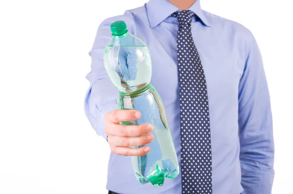 Geschäftsmann bietet grüne Flasche an. — Stockfoto