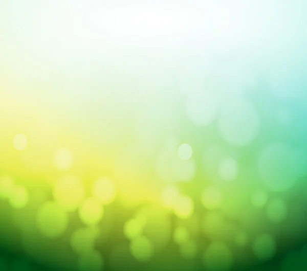 Grüne und gelbe Bokeh abstrakte Licht Hintergrund. — Stockfoto
