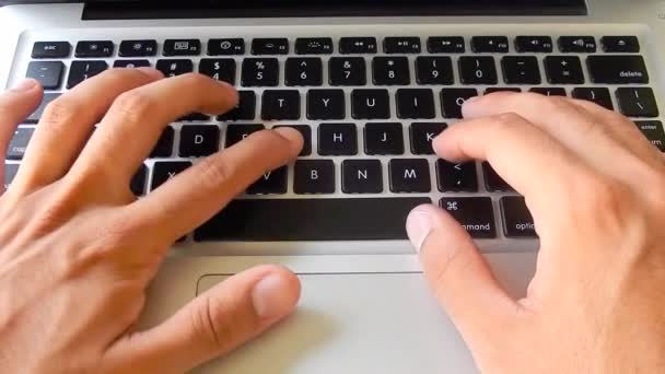 Working under stress. Typing on a laptop keyboard — Stock Video