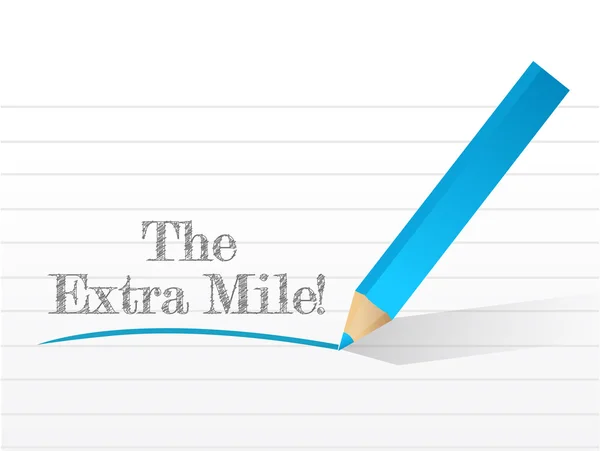 The extra mile sign written on a notepad — Stock Photo, Image