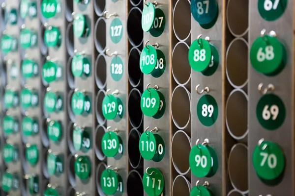 Green repeated numbers on a wall — Stock Photo, Image