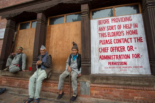 Three elderly men sitting in Nepal — Stock Photo, Image