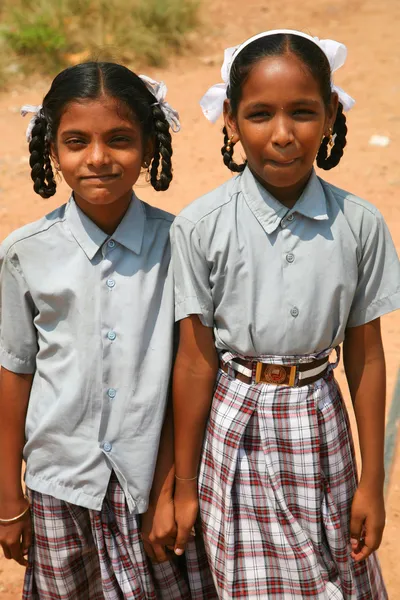 Sisters walking back from school in India — Stock Photo, Image