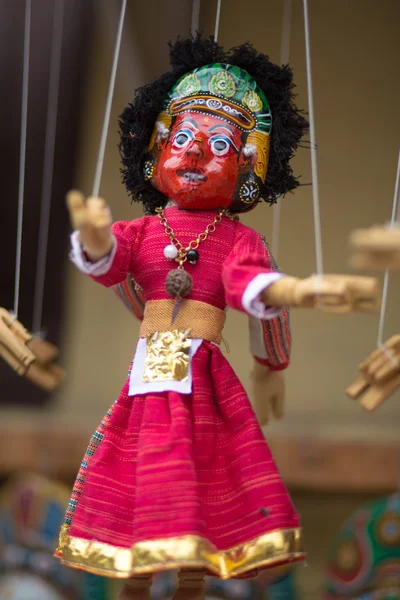 Red puppet on a string in Kathmandu — Stock Photo, Image