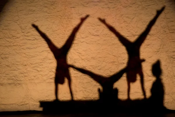 A troup of acrobats performing — Stock Photo, Image