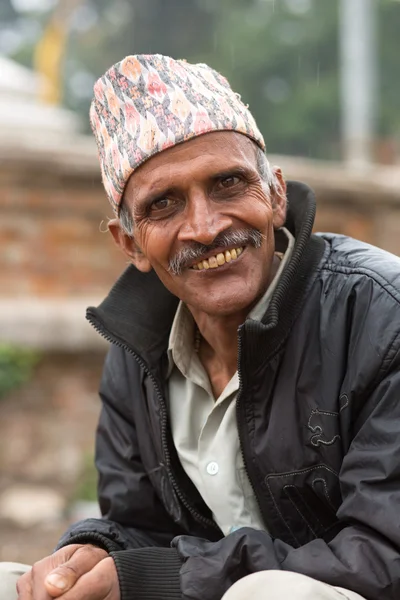 Portrait of a traditional elderly man smiling to the camera in K — Stock Photo, Image