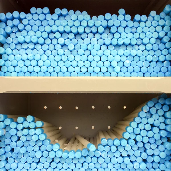 Close up of a group of blue circle candles in Lourdes in France. — Stock Photo, Image