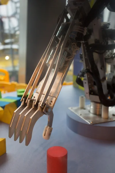Future technology in black prosthetic hand — Stock Photo, Image