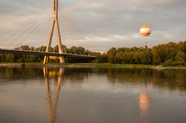 The Swietokrzyski Bridge over Vistula river in Warsaw clipart