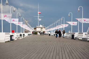 People walking on the Pier of Sopot, Poland clipart
