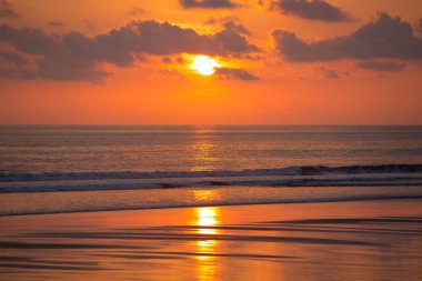Sunset on the beach of Matapalo in Costa Rica clipart