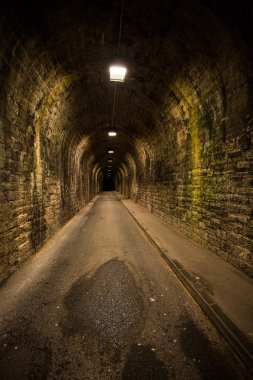 Old vintage tunnel in Biarritz at night clipart