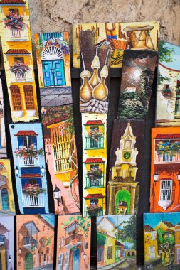 Paintings in souvenirs shop, Cartagena clipart