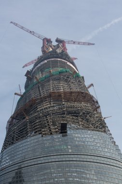 Skyscraper under construction in Shanghai clipart