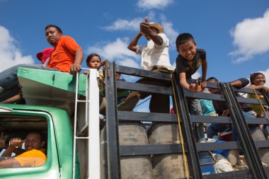 Indian Wayuu traveling on a truck in La Guajira clipart