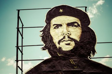 Che Guevara painting over building in Cuba clipart