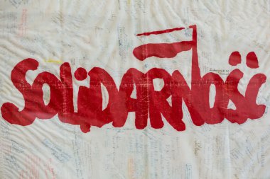 Solidarnosc flag and signatures on white background clipart