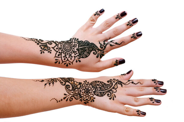 henna being applied to hands