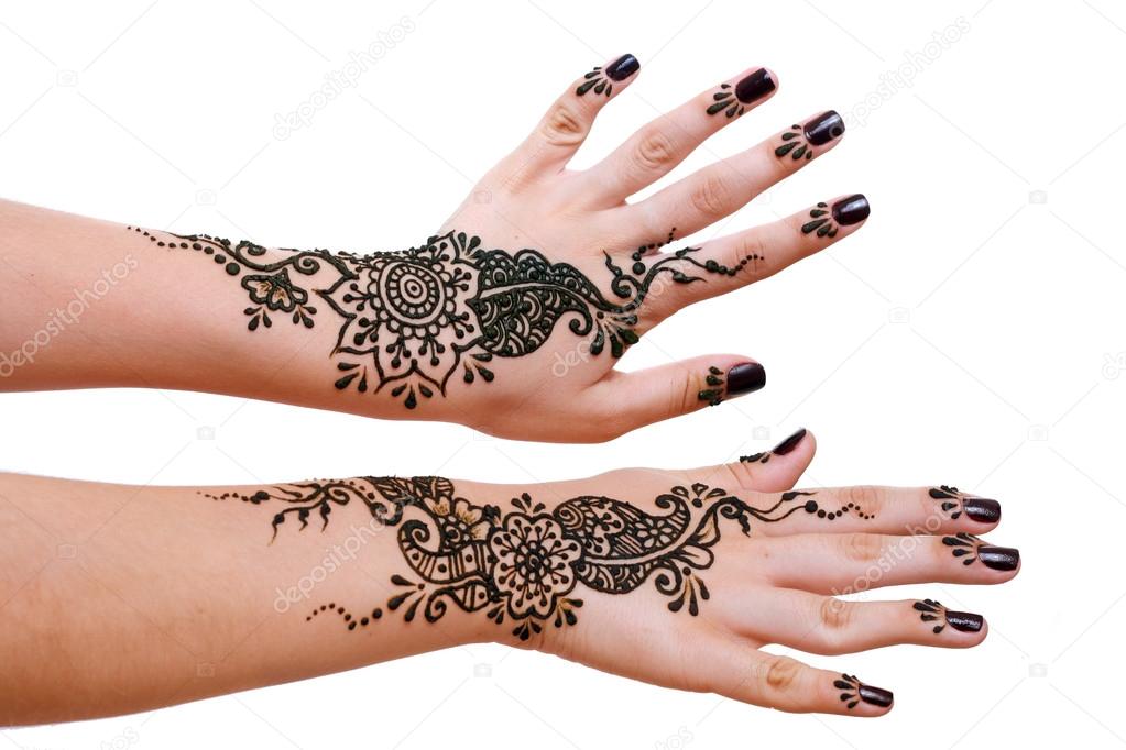henna being applied to hands