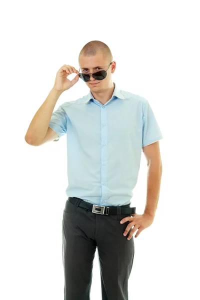 Young man unwearing sunglasses — Stock Photo, Image