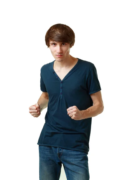 Молодой человек сердитый жестом кулак — стоковое фото