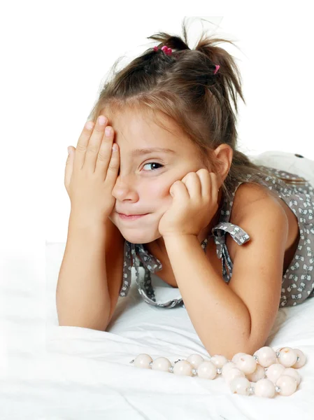 Cheerful little girl with funny tails — Stock Photo, Image