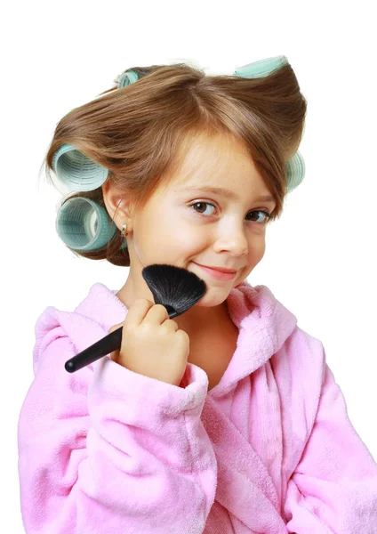 Beautiful girl with hair curlers — Stock Photo, Image