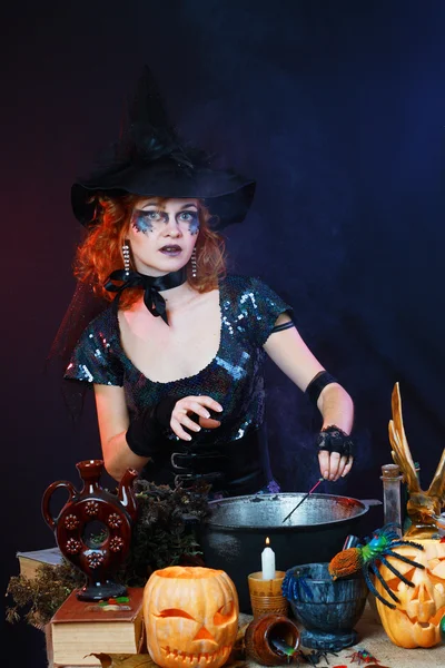 Sexy witch on a dark background — Stock Photo, Image