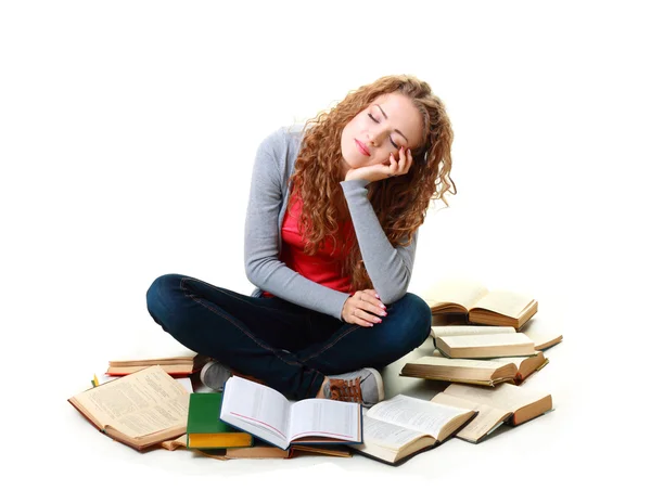Студентська дівчина спить біля книг — стокове фото