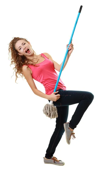 Woman having fun by playing air guitar — Stock Photo, Image