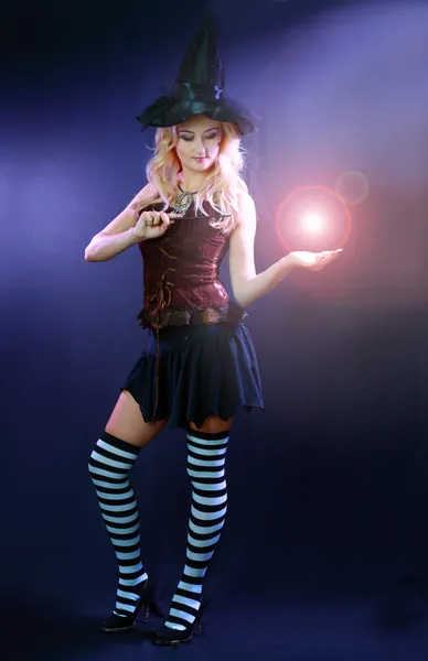 Woman making spell with magic fireball — Stock Photo, Image