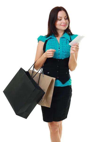 Woman reading receipt after good shopping — Stock Photo, Image