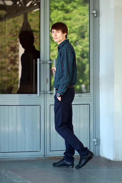 Young man going to enter — Stock Photo, Image