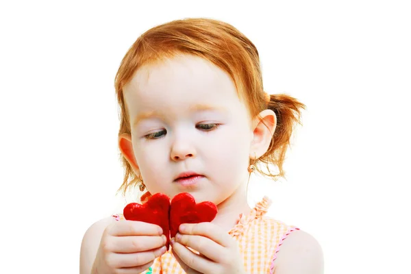 Menina com dois pequeno coração vermelho — Fotografia de Stock