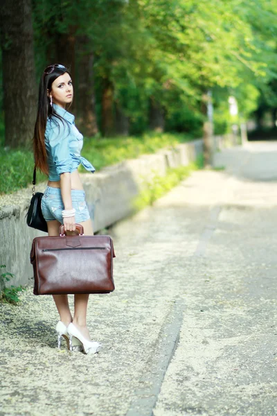 Woman walking away — Stock Photo, Image