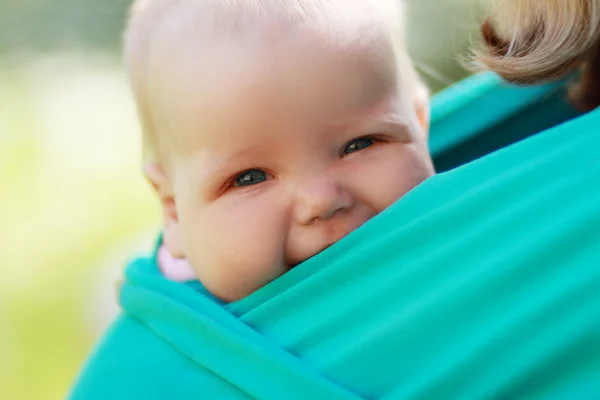 Baby closed to mom in sling — Stock Photo, Image