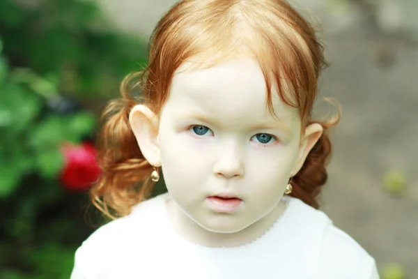 Thoughtful cute little girl — Stock Photo, Image