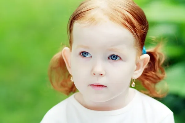 Sad curly little girl — Stock Photo, Image