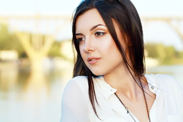 Young woman near the river — Stock Photo, Image