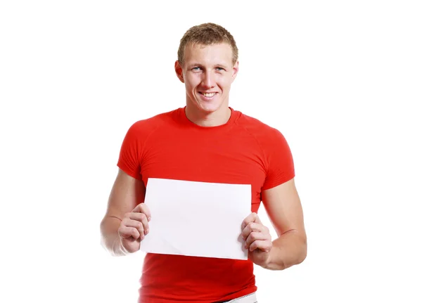 Handsome man holding card — Stock Photo, Image
