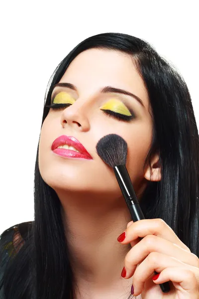 Woman applying blusher — Stock Photo, Image