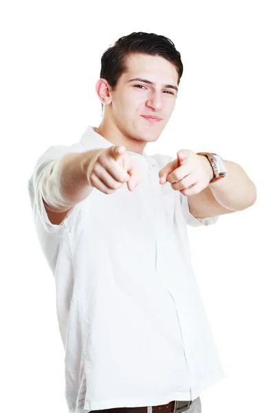 Молодой человек показывает пальцем — стоковое фото