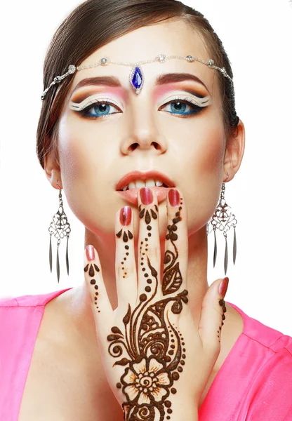 Woman face henna on hand — Stock Photo, Image