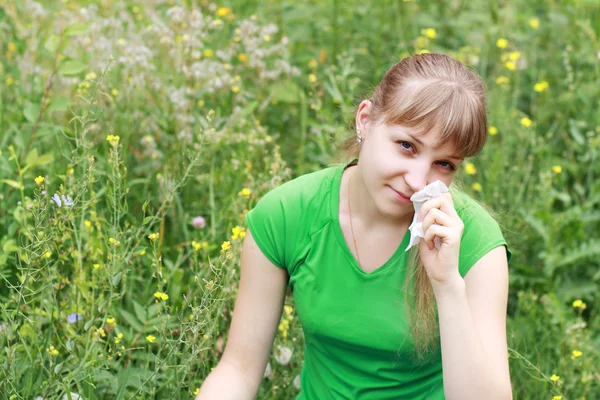 Young woman sneezing — Stock Photo, Image