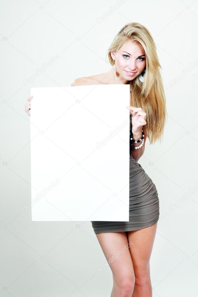 beautiful blond woman hold card
