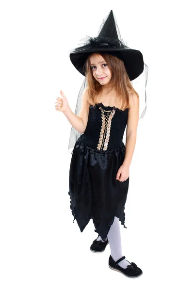 Meisje in witch halloween kostuum — Stockfoto